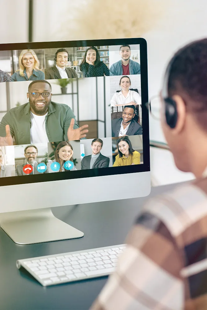 CTI_leadership-program-4 man at computer in a group video call