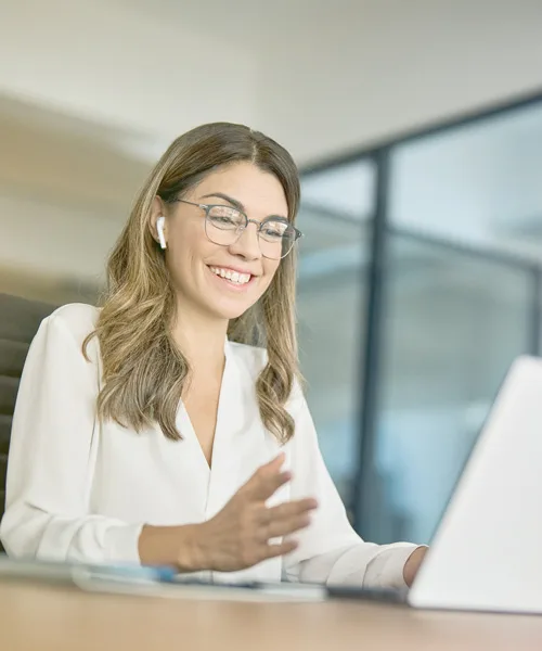 AdobeStock_637048605-2 woman video meeting on laptop