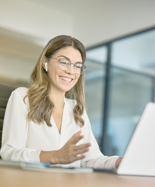 AdobeStock_637048605-2 woman video meeting on laptop
