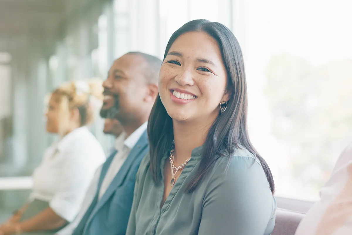 Coach-1 Woman smiling in group
