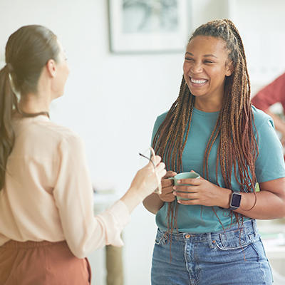 Friends talking about how to dance in the moment.