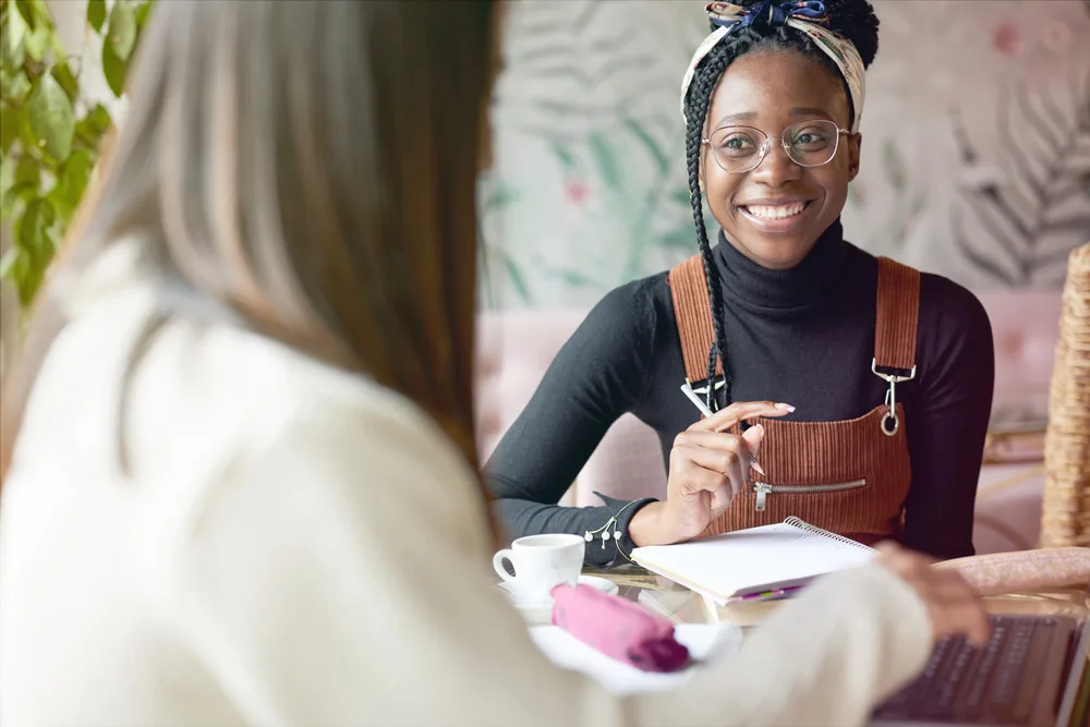 group conversation at coffee shop