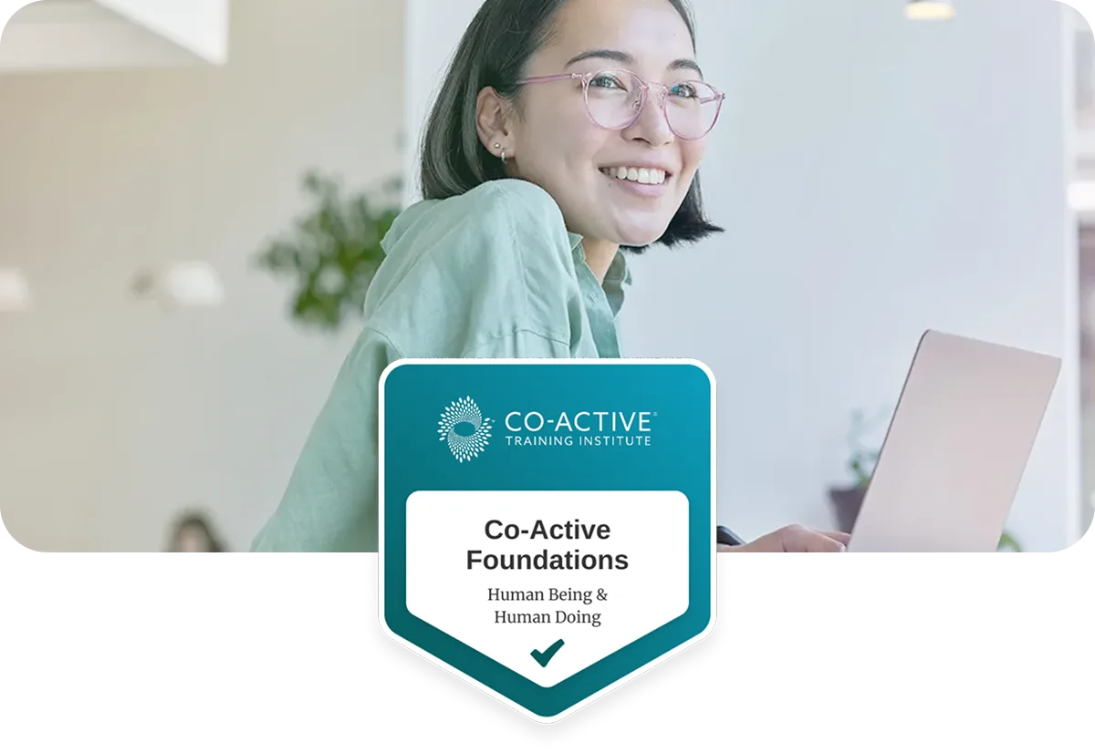 Woman smiling working on computer