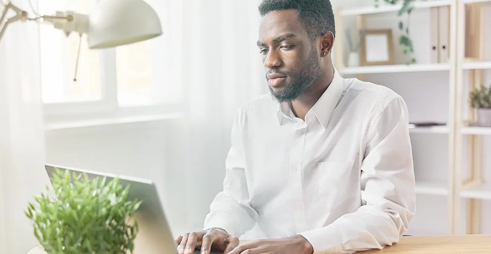 man using laptop