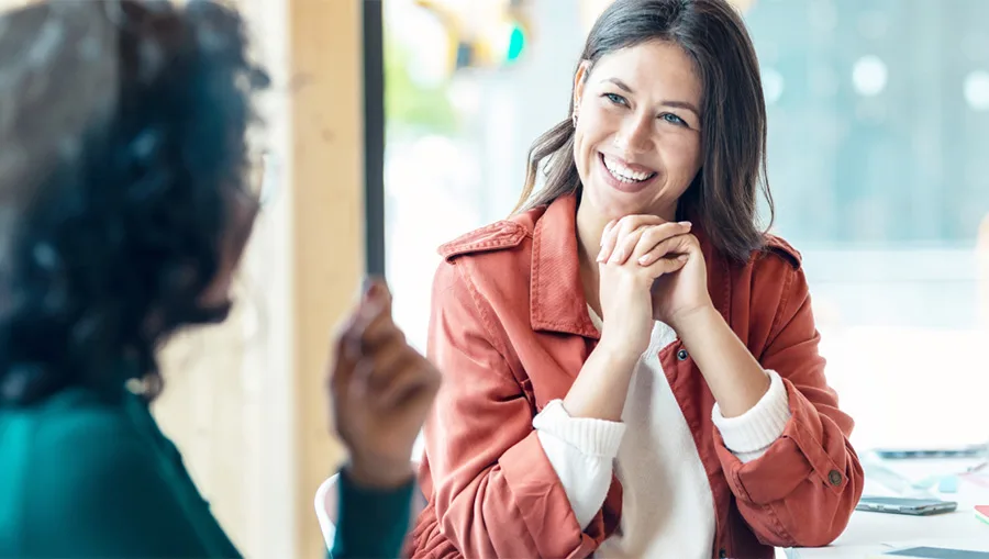 woman watching webinar on laptop