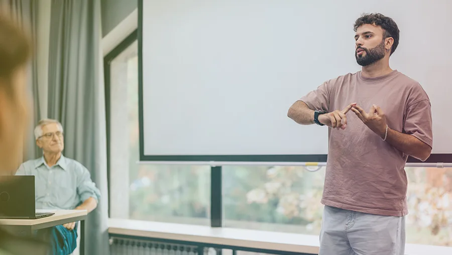 woman watching webinar on laptop
