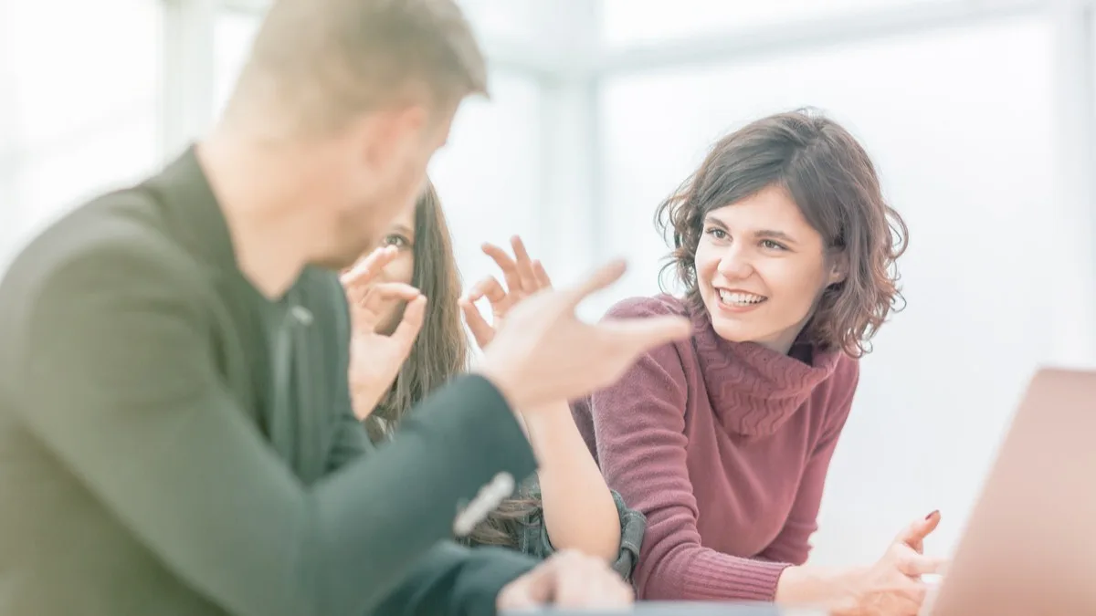 Leaders discussing distributed leadership at work