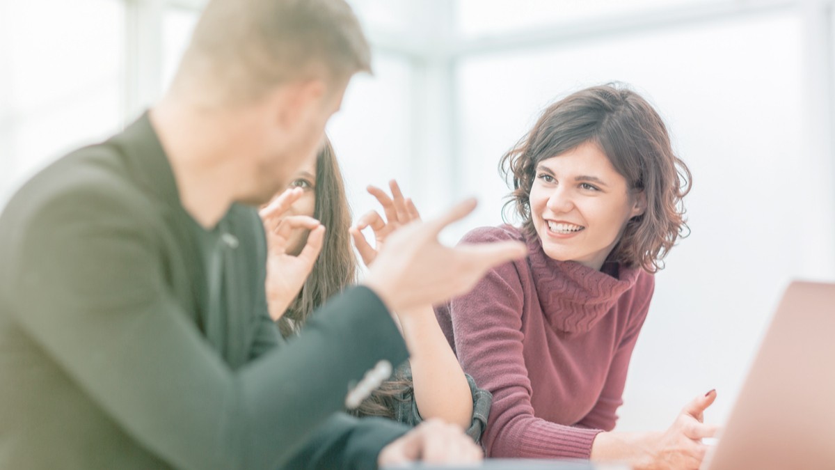 Leaders discussing distributed leadership at work