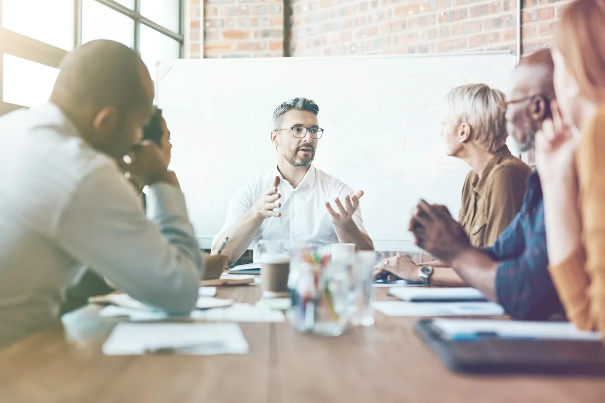 Team leadership discussion during collaborative workshop