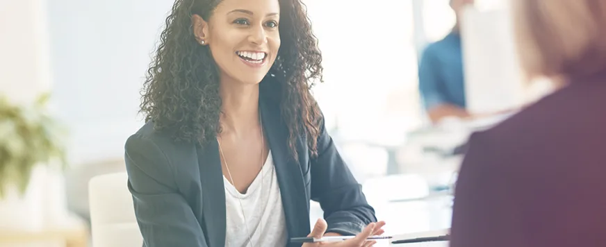 woman in conversation in professional setting