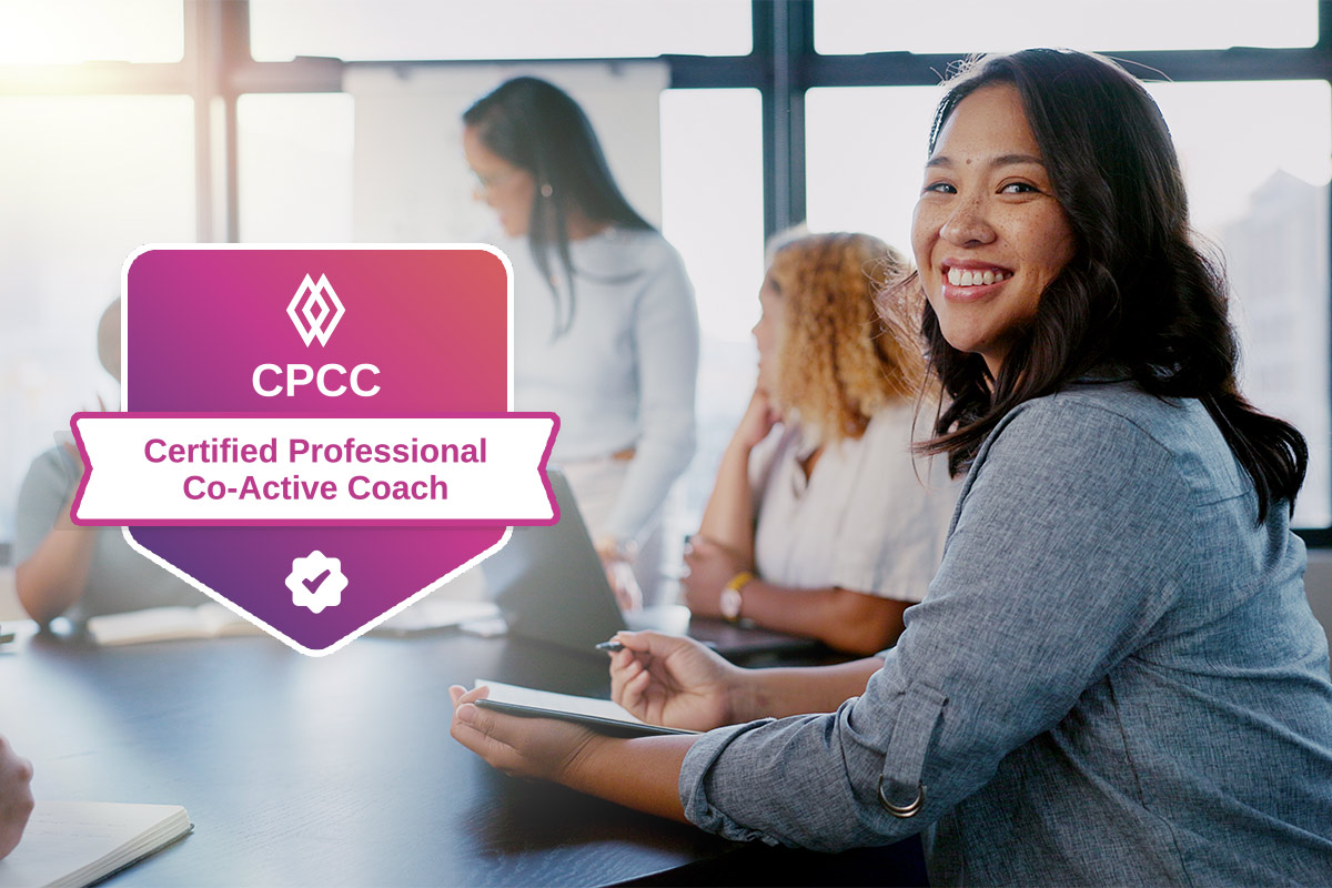 Woman smiling during a meeting with a CPCC certification badge overlay.