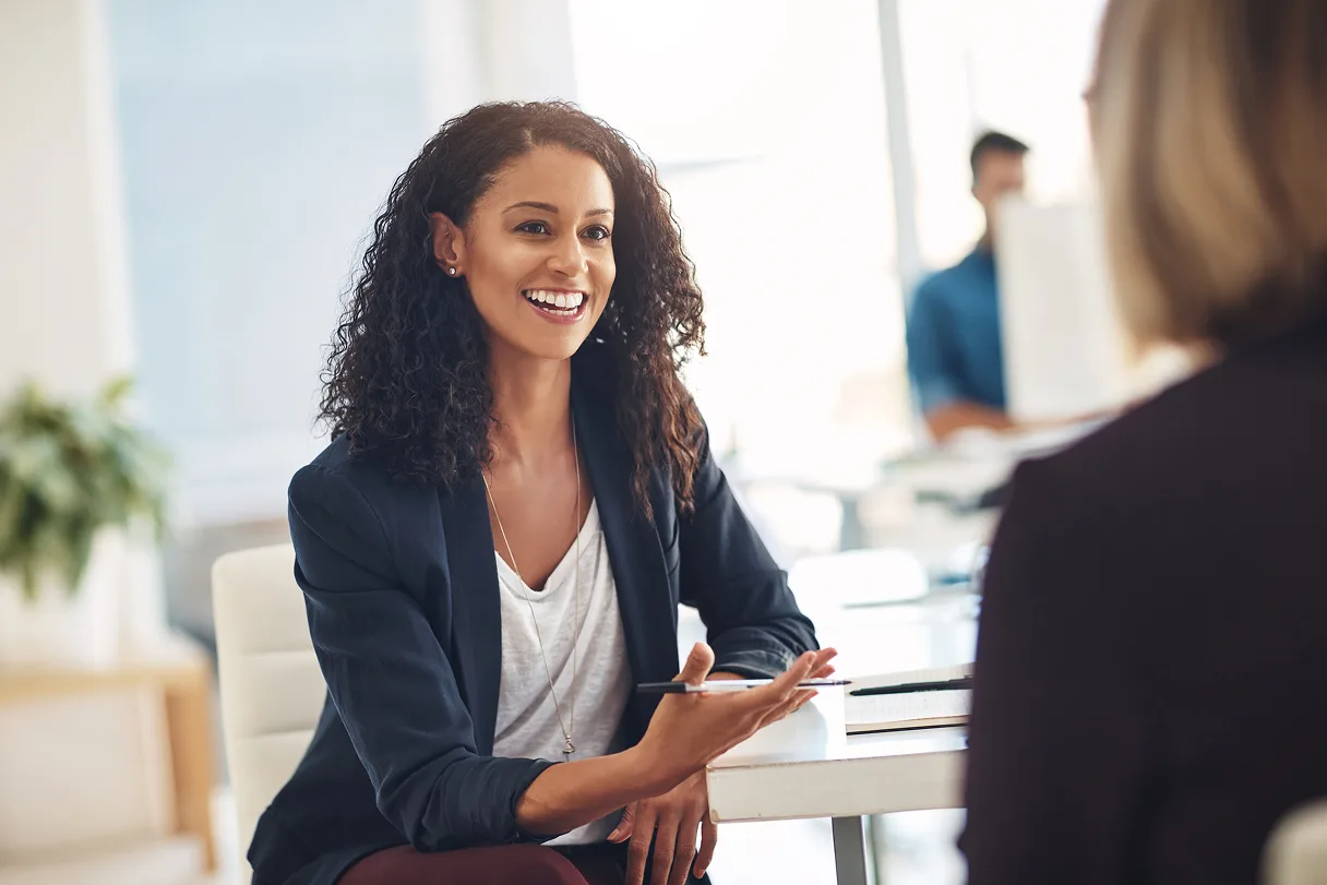 Smiling woman in professional discussion