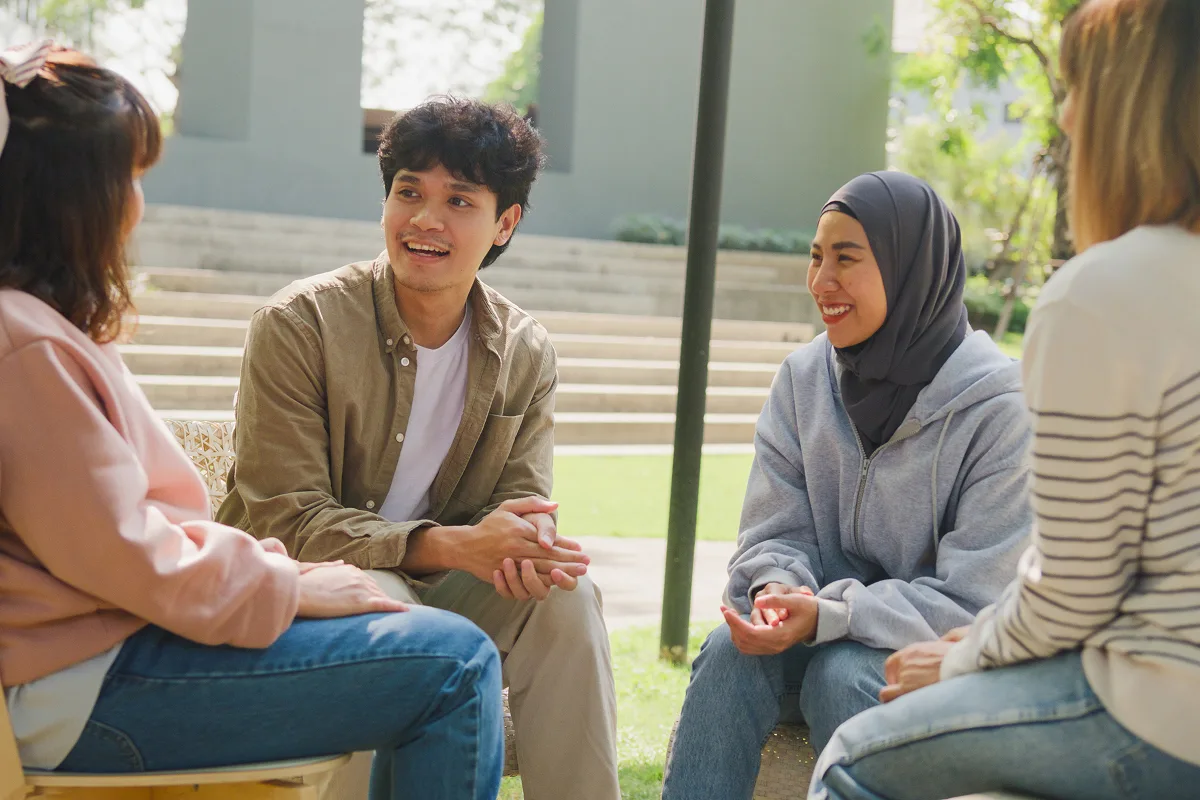 Group of friends engaged in conversation