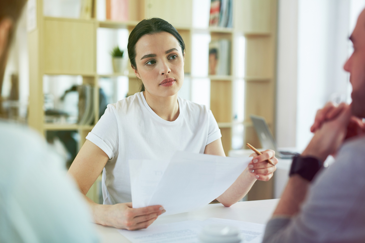 Two people talking during a coaching conversation.