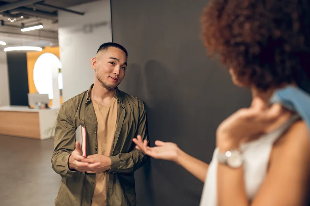 Two people engaged in conversation.